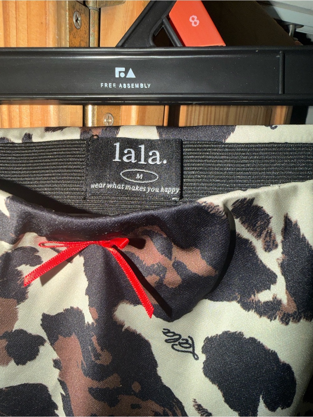 Dressed in LALA Leopard Print Satin Maxi Skirt with Red Lace Hem - Picture 3 of 4